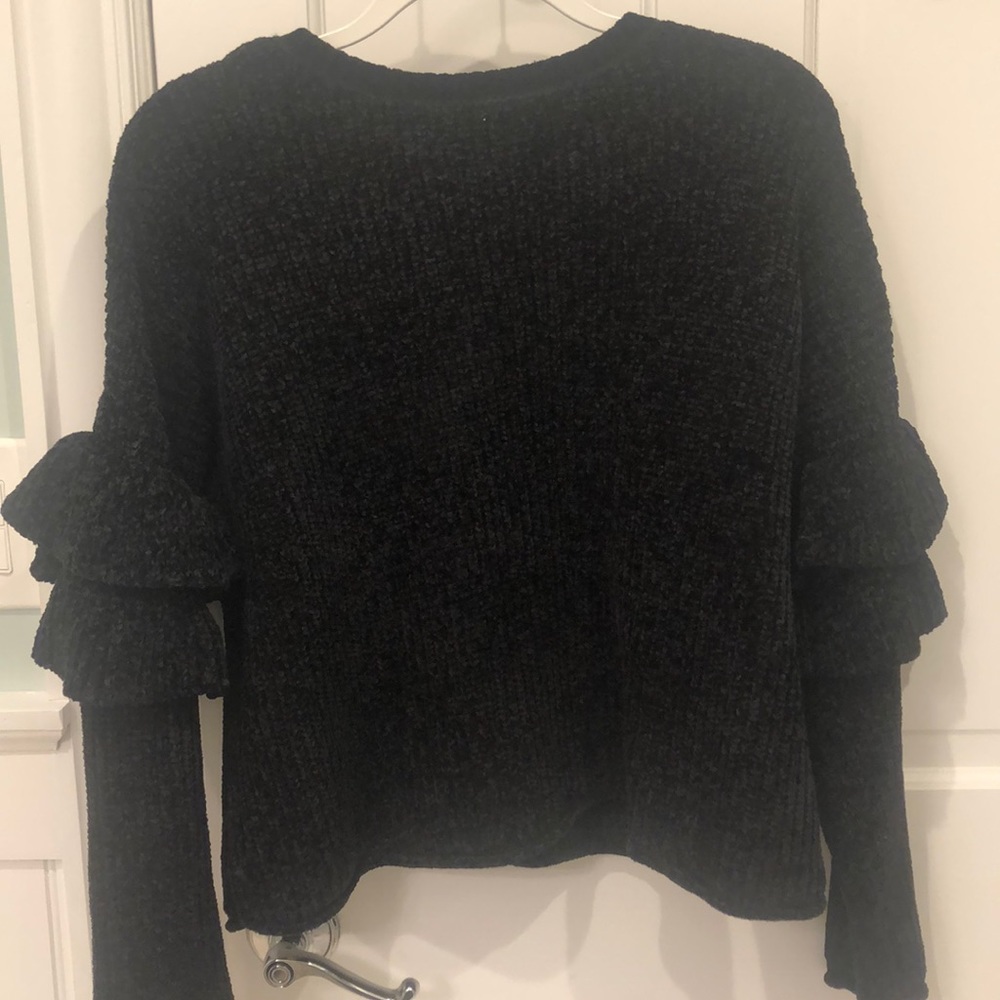 Soft black peplum sleeve sweater